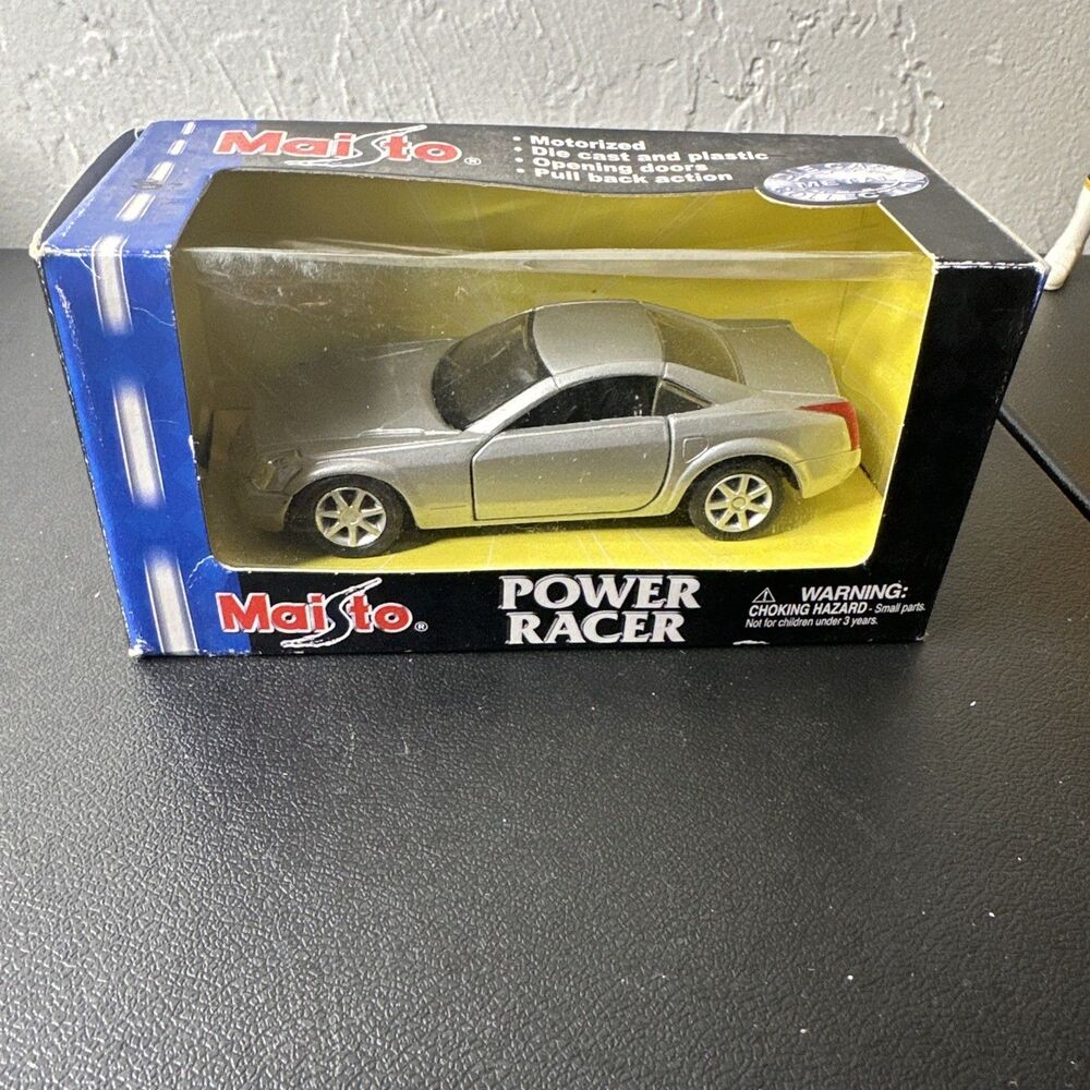 Maisto Power Racer 1:37 scale Cadillac Evoq diecast model car in silver
